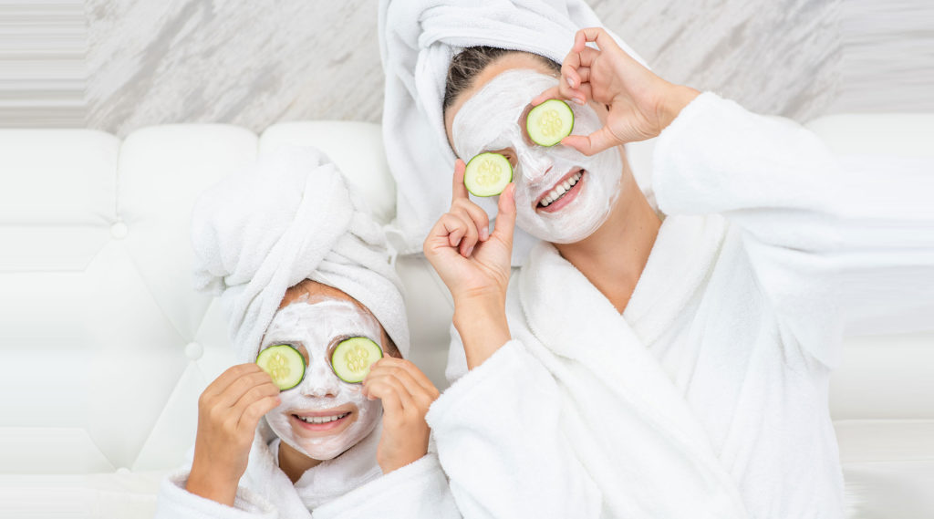 Mommy and Daughter Applied Mask on Face & Cover Their Eyes with Cucumber | Melindas Med Spa & Salon in North Myrtle Beach, SC